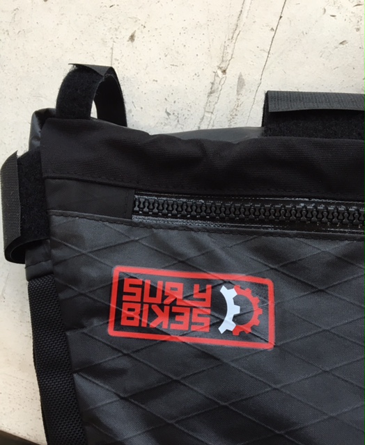 Surly Straggler-Check bag - black - close up of printed graphics