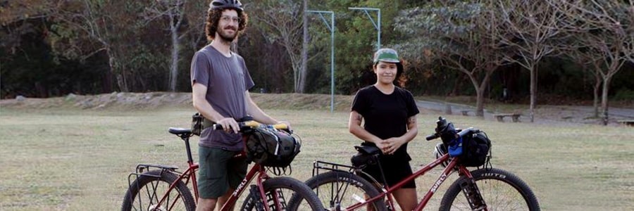 Two folks on Surly bikes