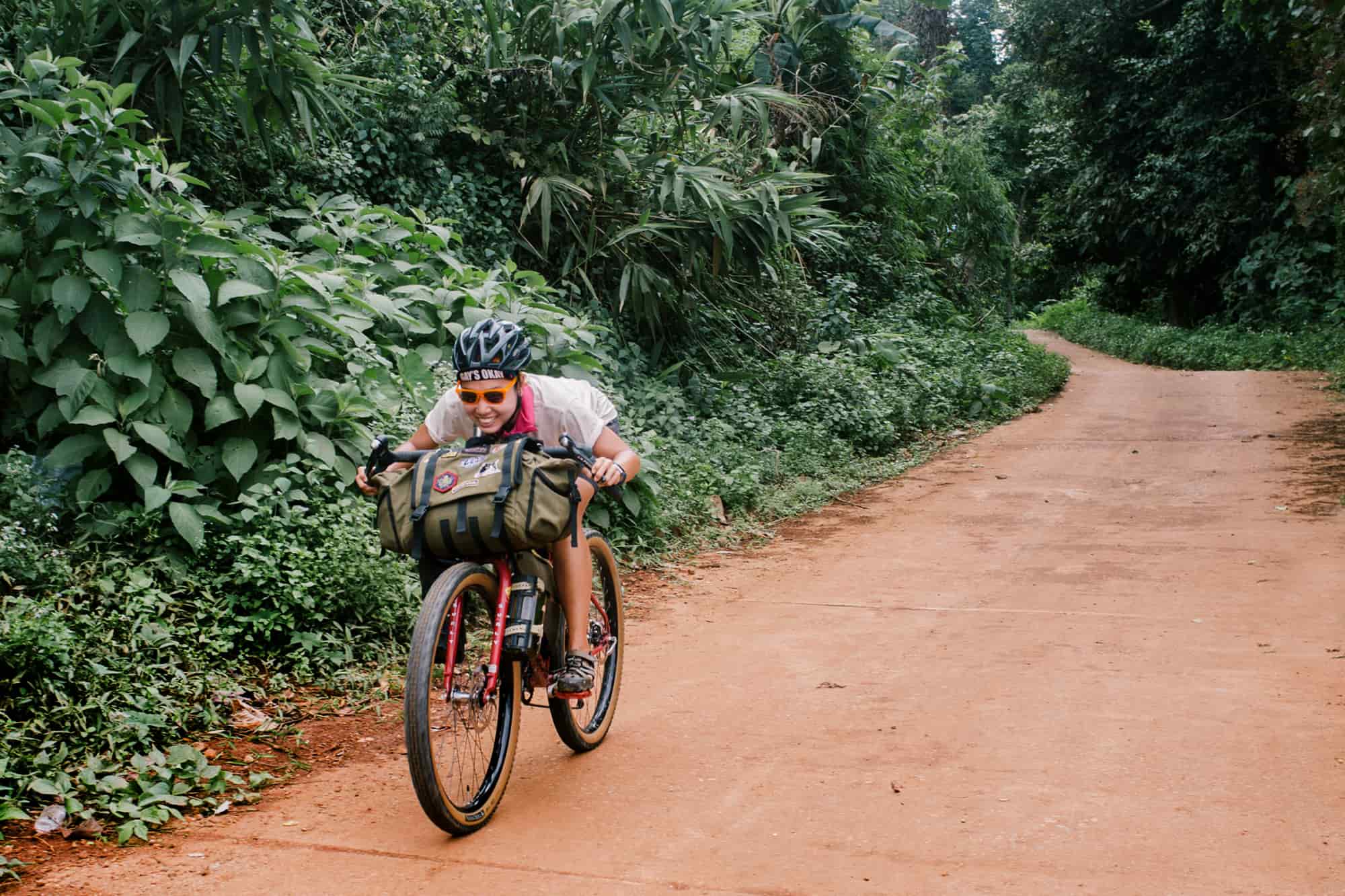 Rider Immu Tucked Riding a Bike Down a Hill