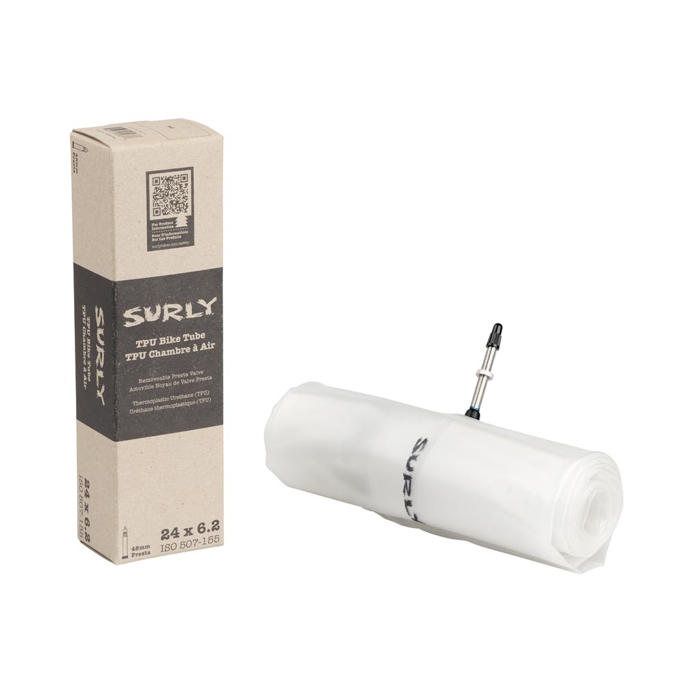 Surly TPU Tube package and tube rolled up on white background