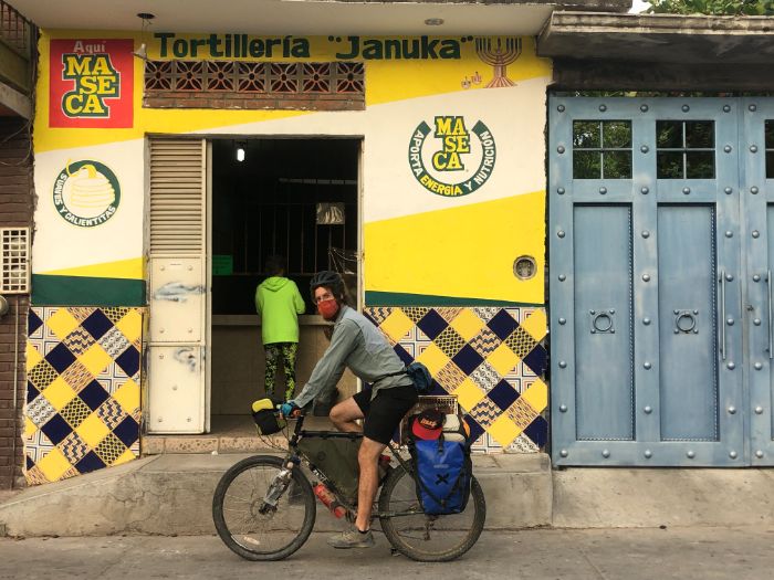 Jake on his bike at the Tortilleria